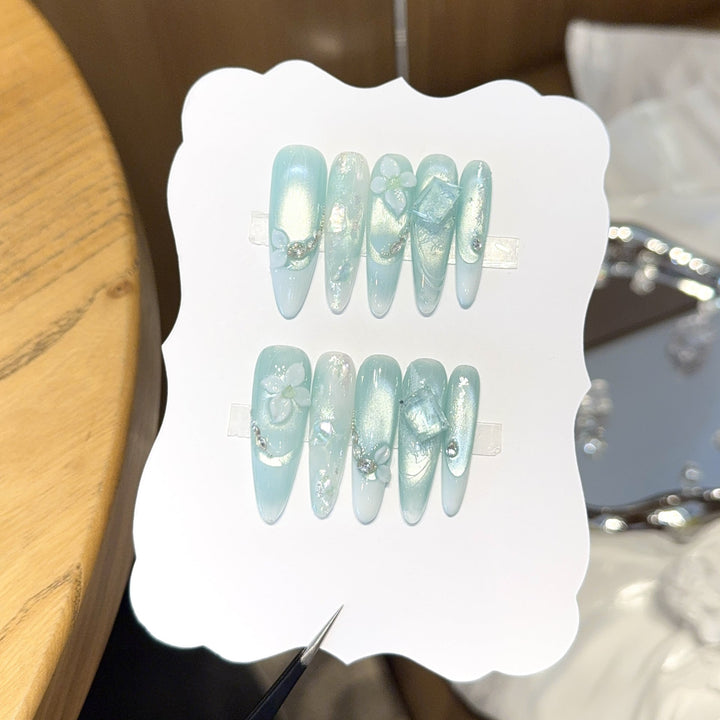 Artificial nails with floral designs and glitter effects Kalsten