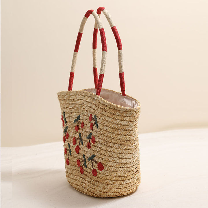 Handcrafted basket bag with vibrant floral embroidery design Kalsten