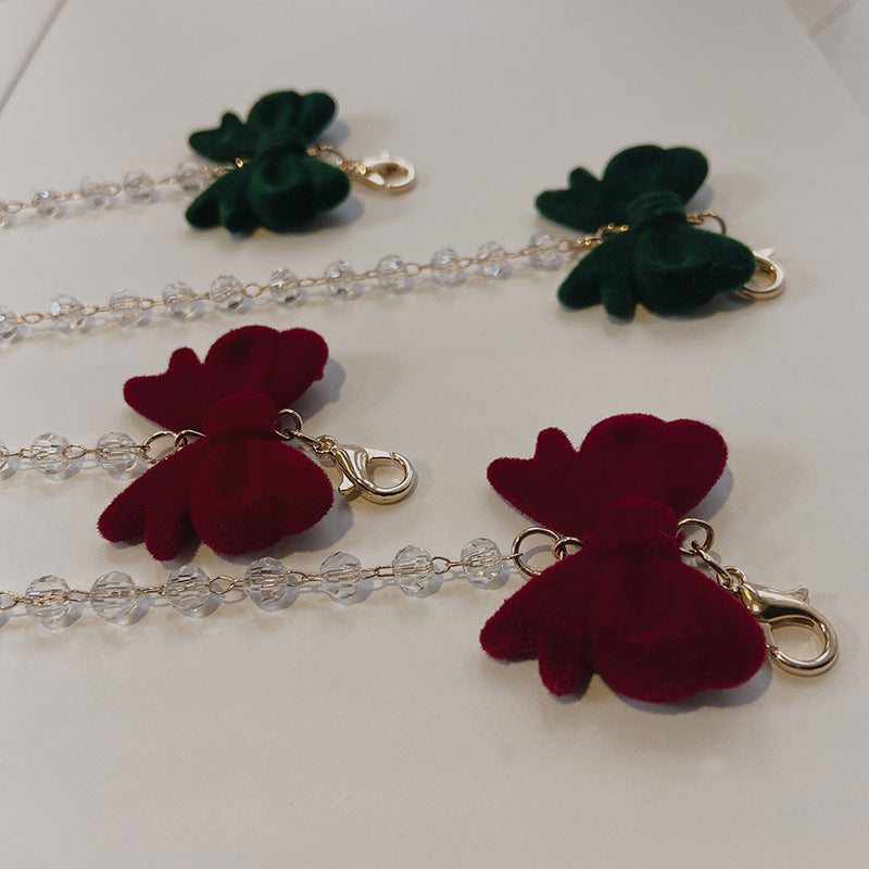 Jewelry holder chain with velvet bow pendant Kalsten