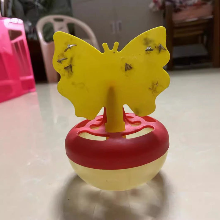 Butterfly-shaped sticky insect trap with refillable liquid reservoir and reusable base Kalsten