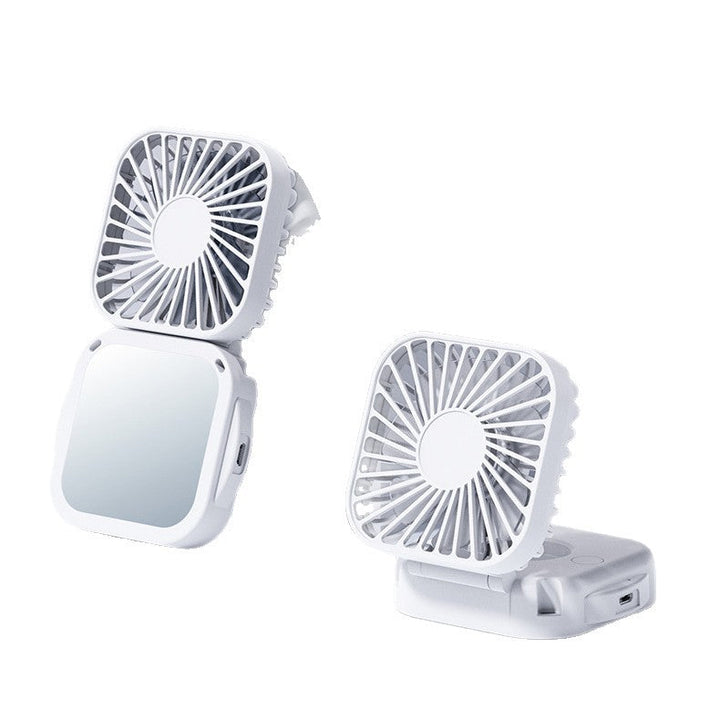 Unisex nan compact foldable clip on handheld desk fan with built in mirror adjustable tilt and USB rechargeable battery Kalsten