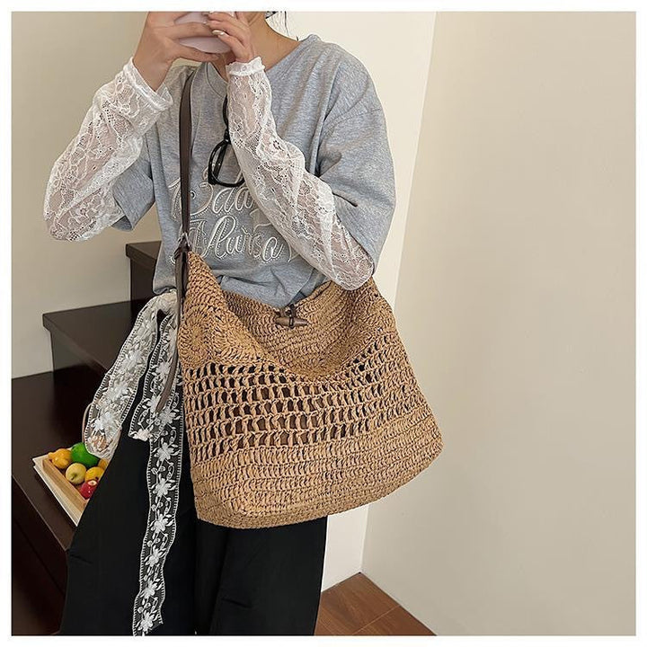 Braided summer handbag with practical leather handles Kalsten