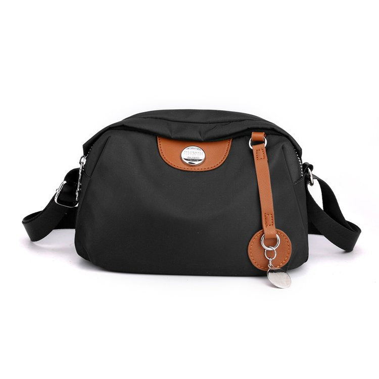 Shoulder bag with adjustable shoulder strap and clear compartment system Kalsten