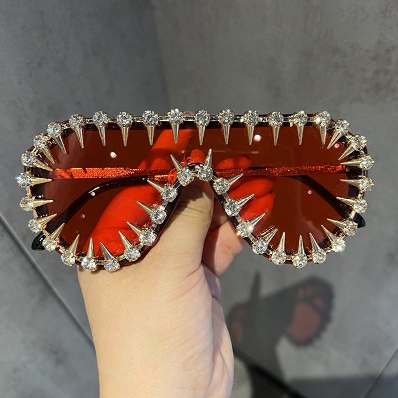 Ladies extravagantly designed cat-eye sunglasses with glitter accents Kalsten