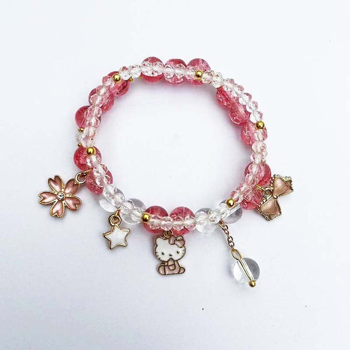 Elegant bracelet with animal and glitter pendants Kalsten