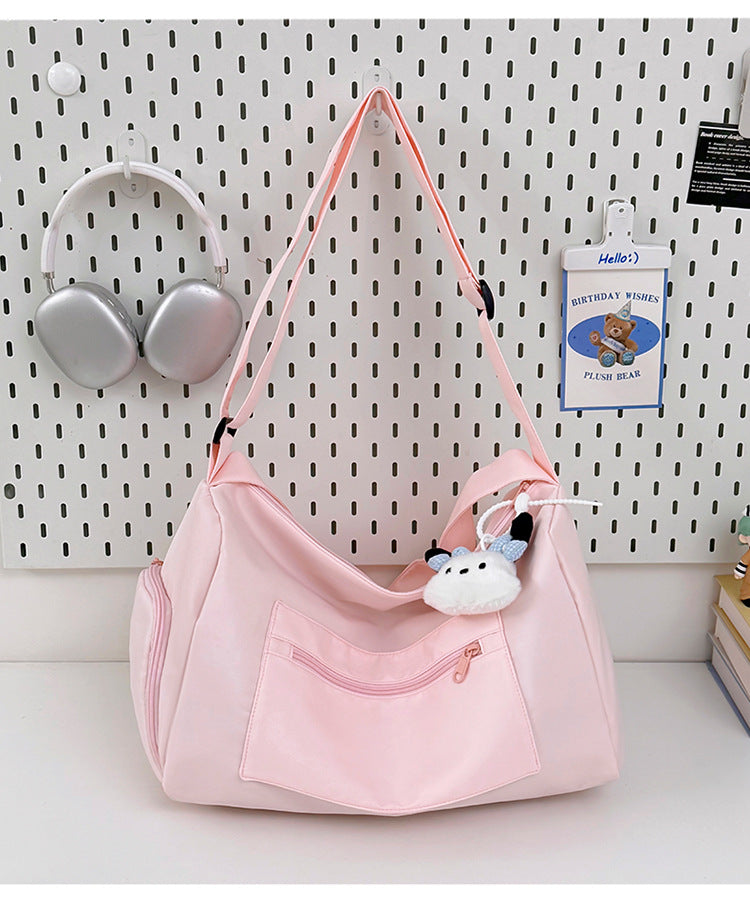 Sporty shoulder bag with spacious interior and sturdy carrying strap Kalsten