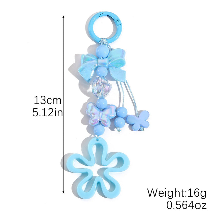 Playful keychain with flower and butterfly details Kalsten