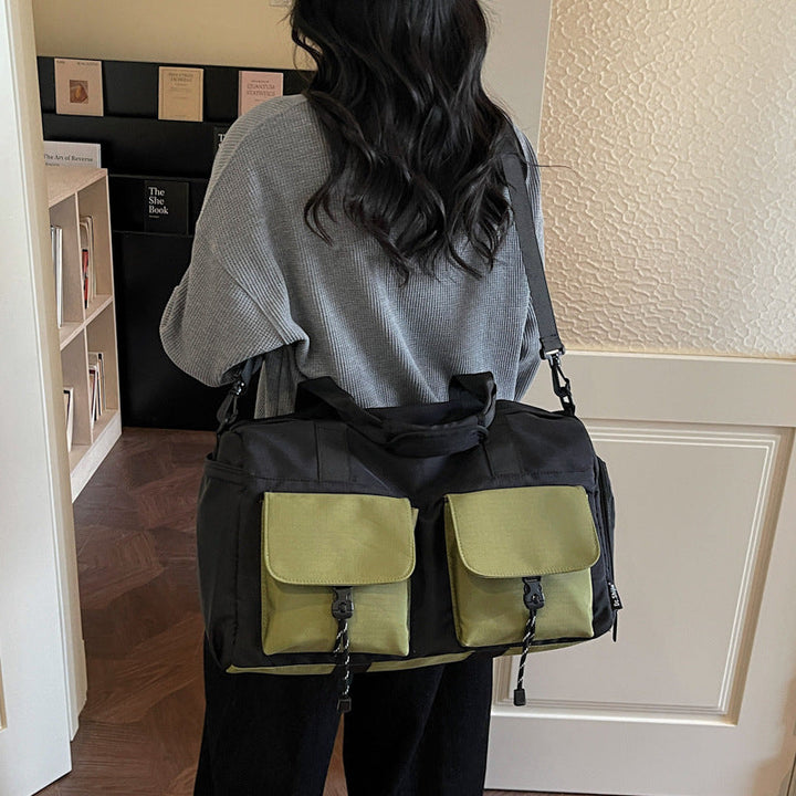 Multifunctional tote bag with comfortable shoulder padding and numerous outer pockets Kalsten