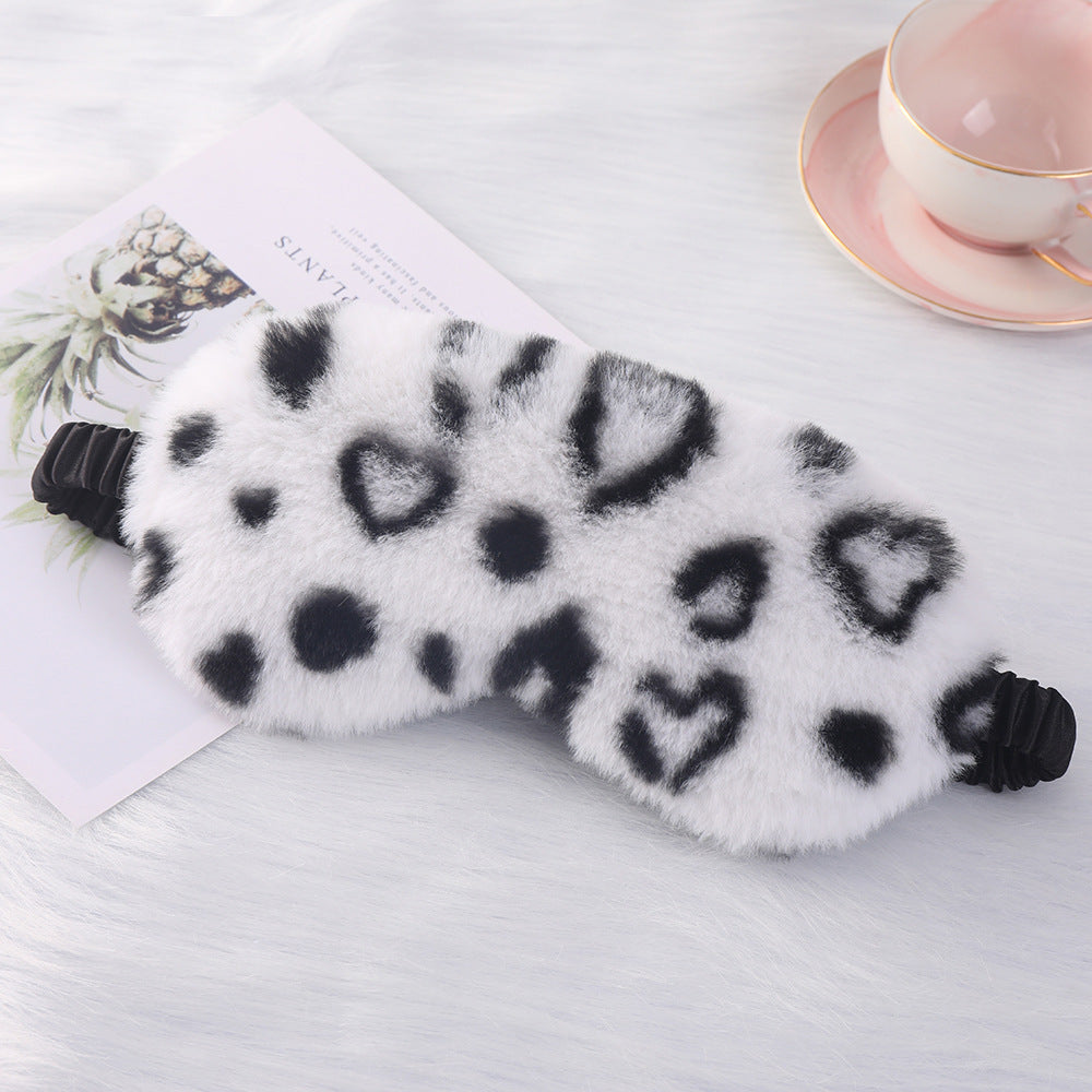 Women's cuddly faux fur sleep mask with heart-embossed surface and gathered comfort band Kalsten
