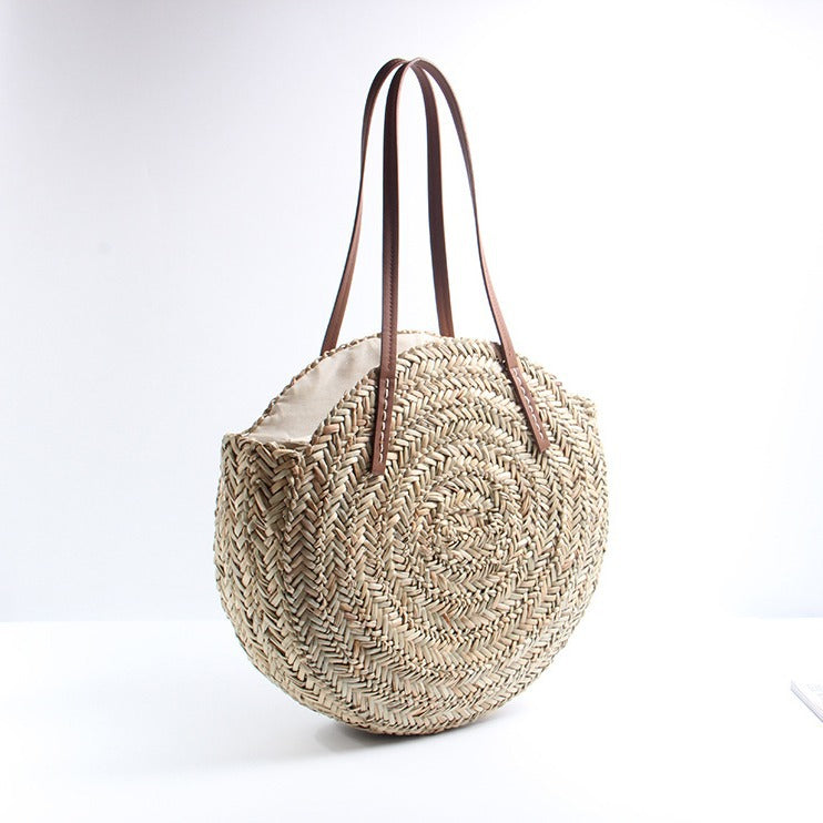 Braided straw beach bag with elegant leather handles Kalsten