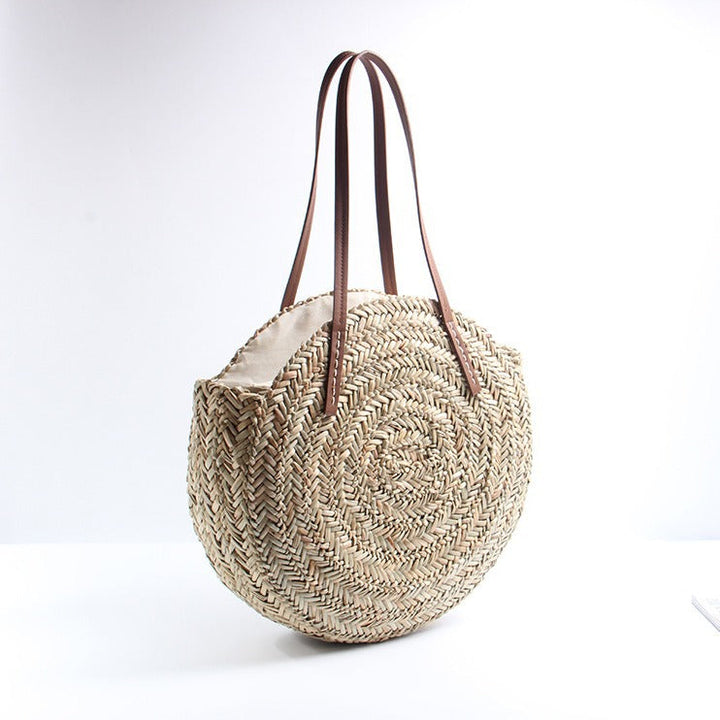 Braided straw beach bag with elegant leather handles Kalsten