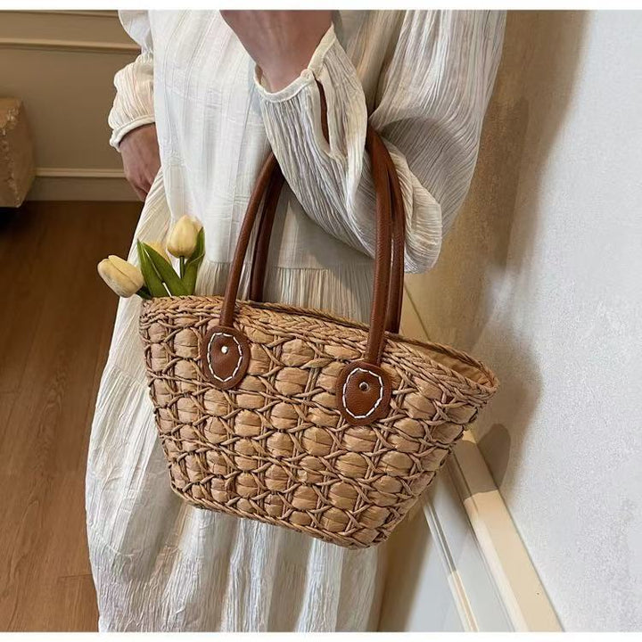 Handcrafted basket bag with elegant leather accents Kalsten