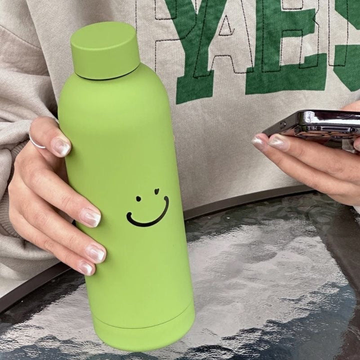 Women's insulated drinking bottle with modern smiley design Kalsten