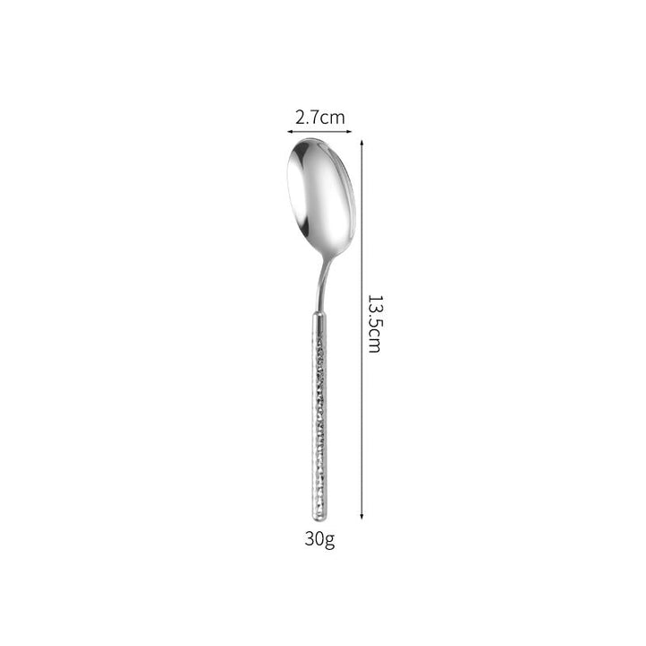 Elegant dessert spoon with elaborate handle design Kalsten