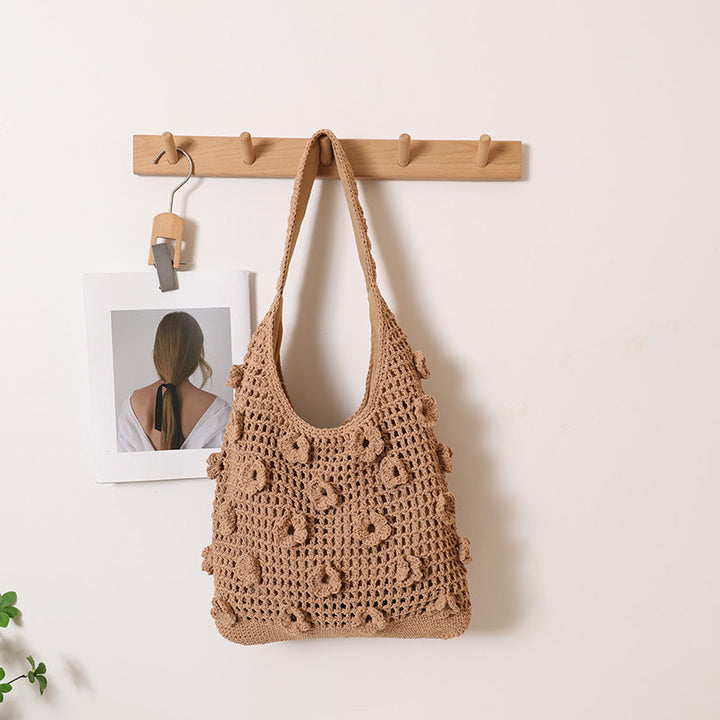 Hand-knotted shoulder bag with floral structural elements Kalsten