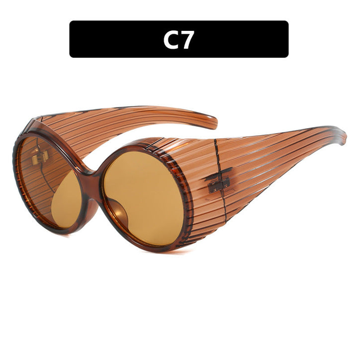 Women's extravagant sunglasses with curved frame Kalsten