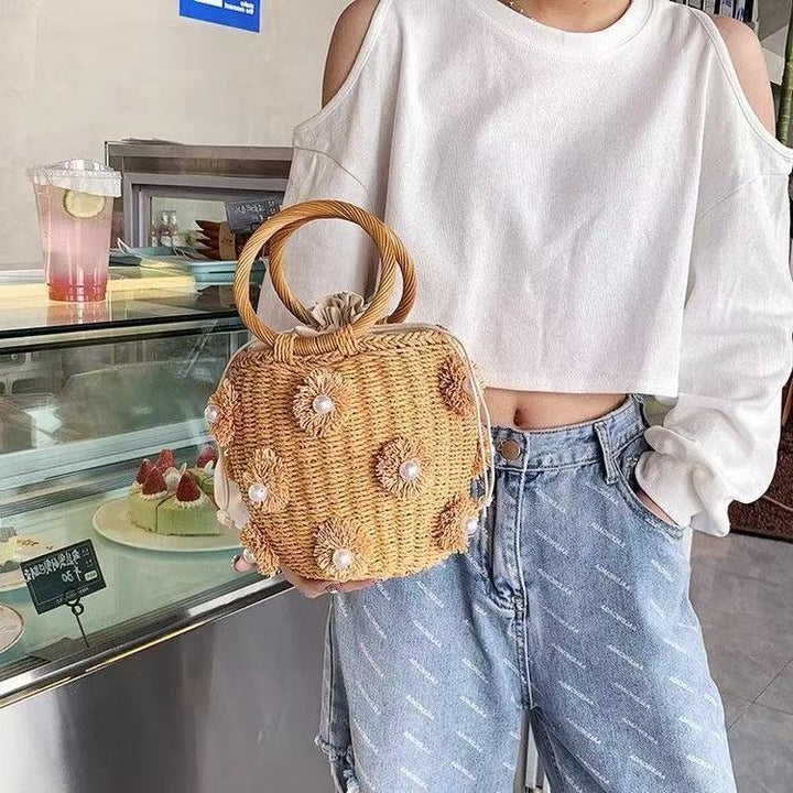 Refined handbag with pearl applications Kalsten