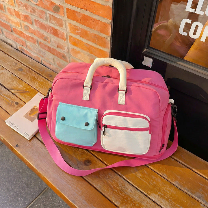 Sporty travel bag with multiple pockets and adjustable shoulder strap Kalsten