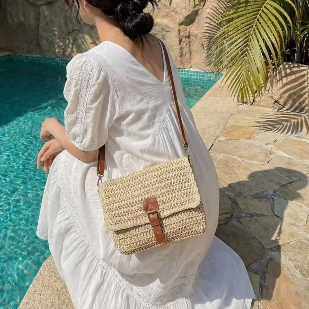 Handbag made of braided natural material with adjustable shoulder strap Kalsten