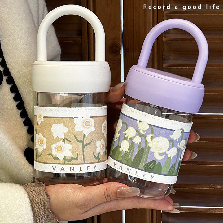 Women's insulated drinking bottle with ergonomic carrying handle and elegant flower design Kalsten