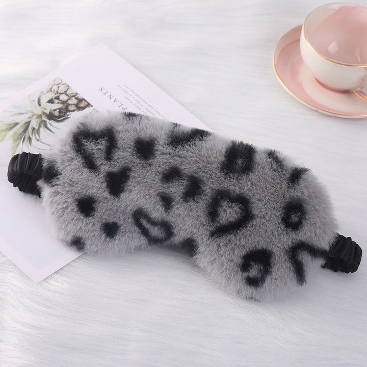 Women's cuddly faux fur sleep mask with heart-embossed surface and gathered comfort band Kalsten