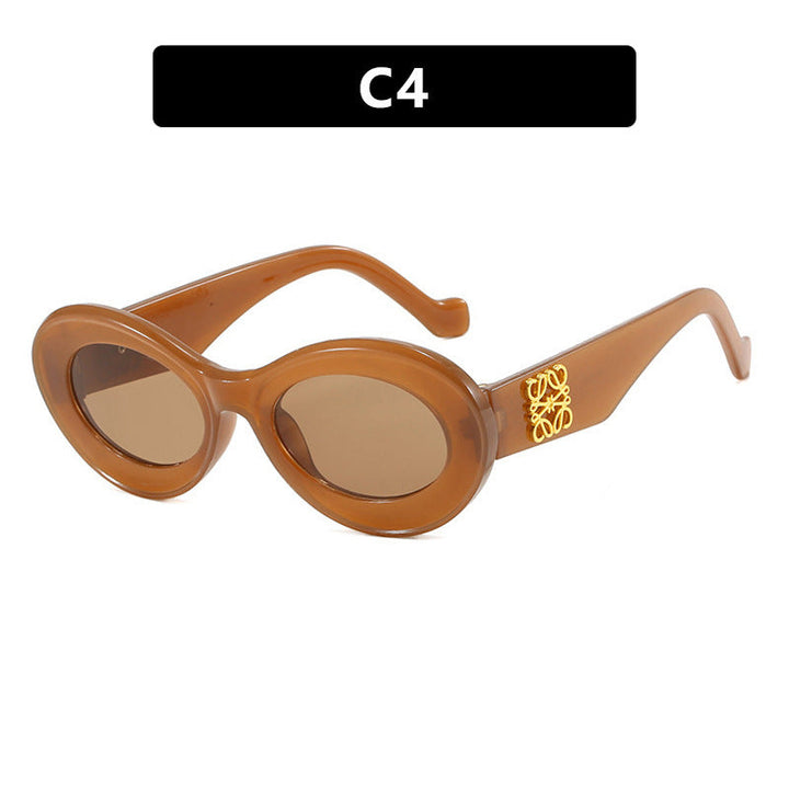 Women's fashionable sunglasses with oval frame and golden accents Kalsten