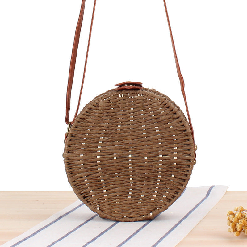 Round basket bag with leather accents Kalsten