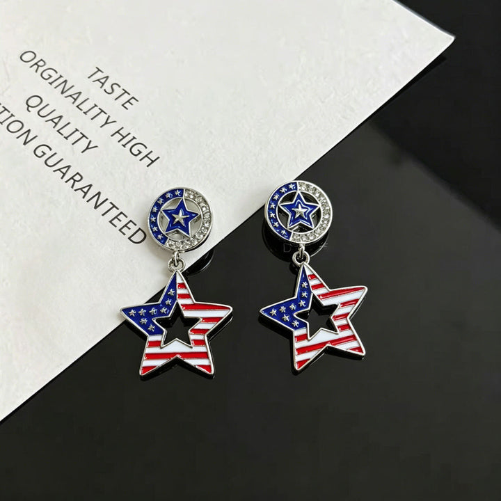 Ladies hanging earrings with star pendant and enamel flag motif Kalsten