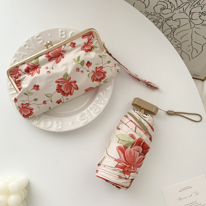 Ladies elegant folding umbrella with floral design and practical case Kalsten