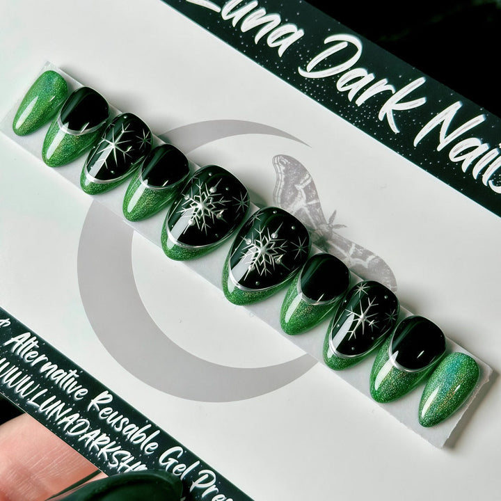 Glamorous artificial nails with intricate Christmas design Kalsten