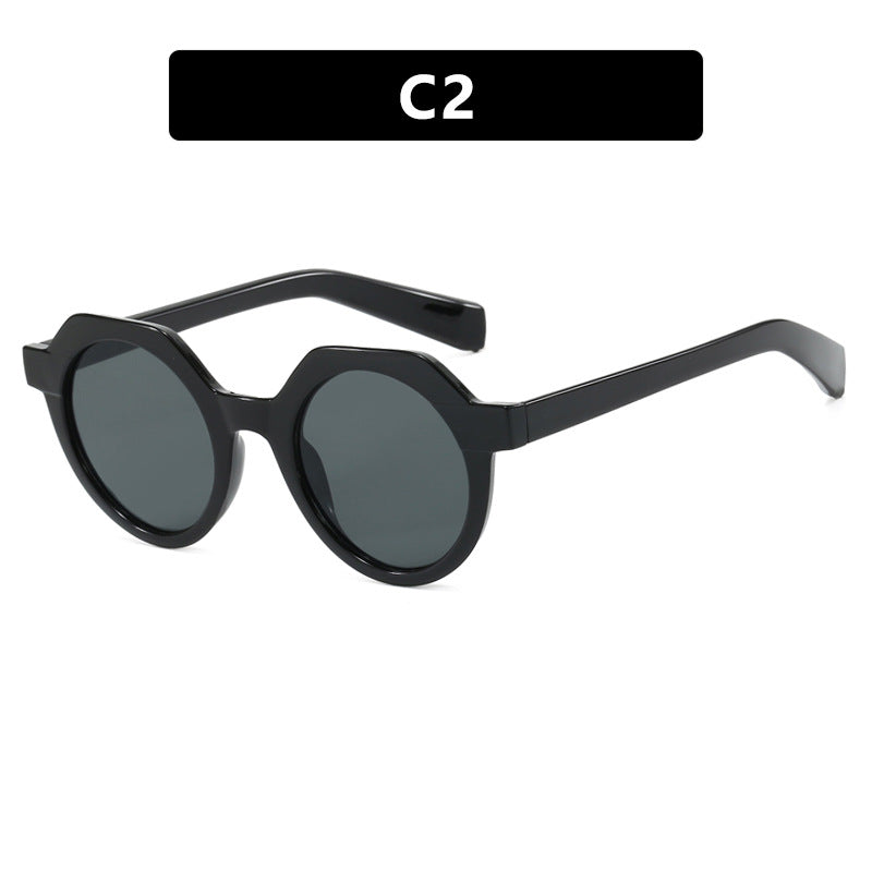Ladies extravagant round sunglasses with colored accented frame Kalsten