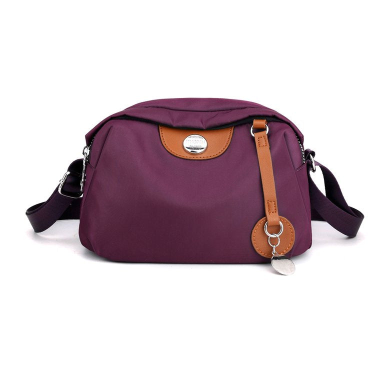 Shoulder bag with adjustable shoulder strap and clear compartment system Kalsten