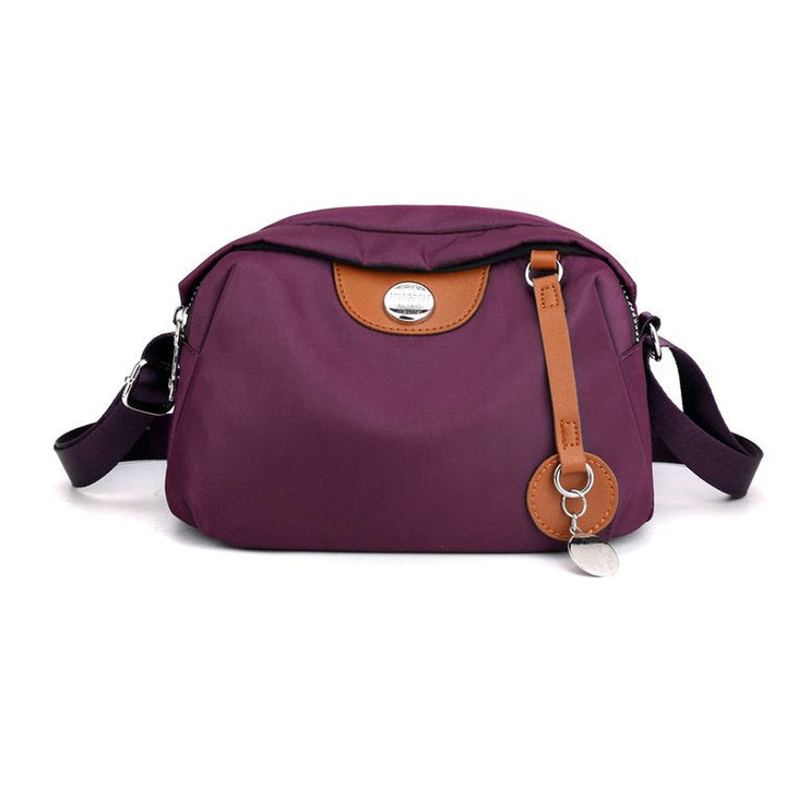 Shoulder bag with adjustable shoulder strap and clear compartment system Kalsten