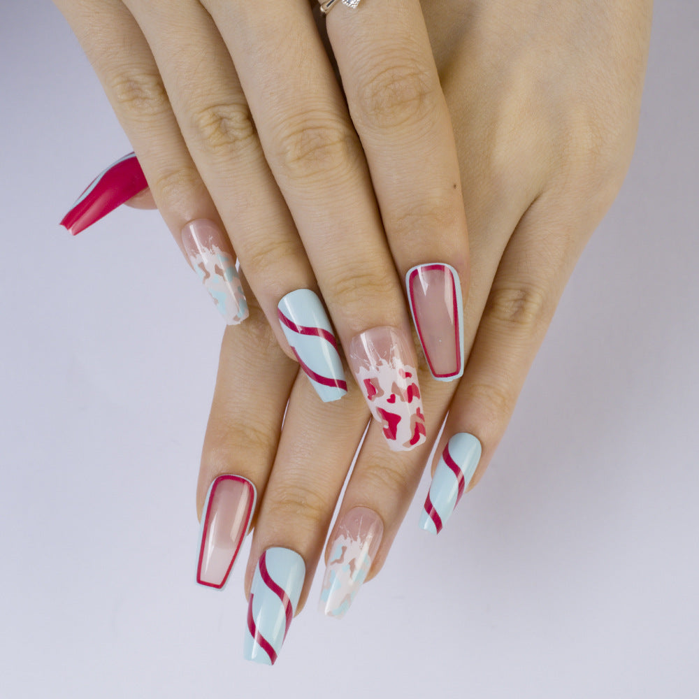 Artificial nails with modern wave pattern and heart accents Kalsten