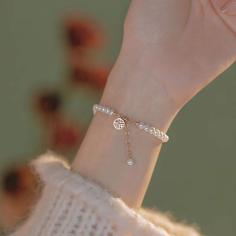 Elegant Pearl Charm Bracelet Kalsten