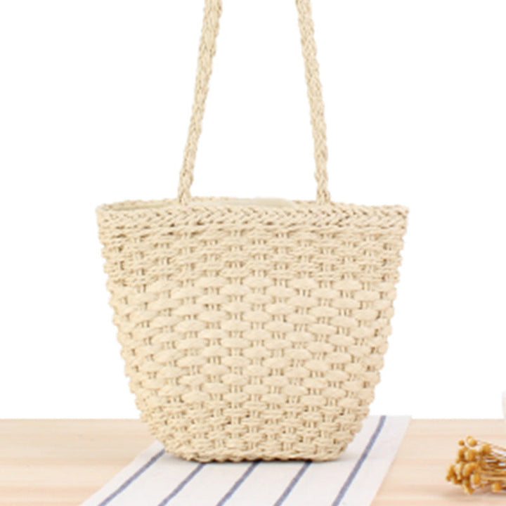 Braided handbag made of natural raffia with robust carrying straps Kalsten