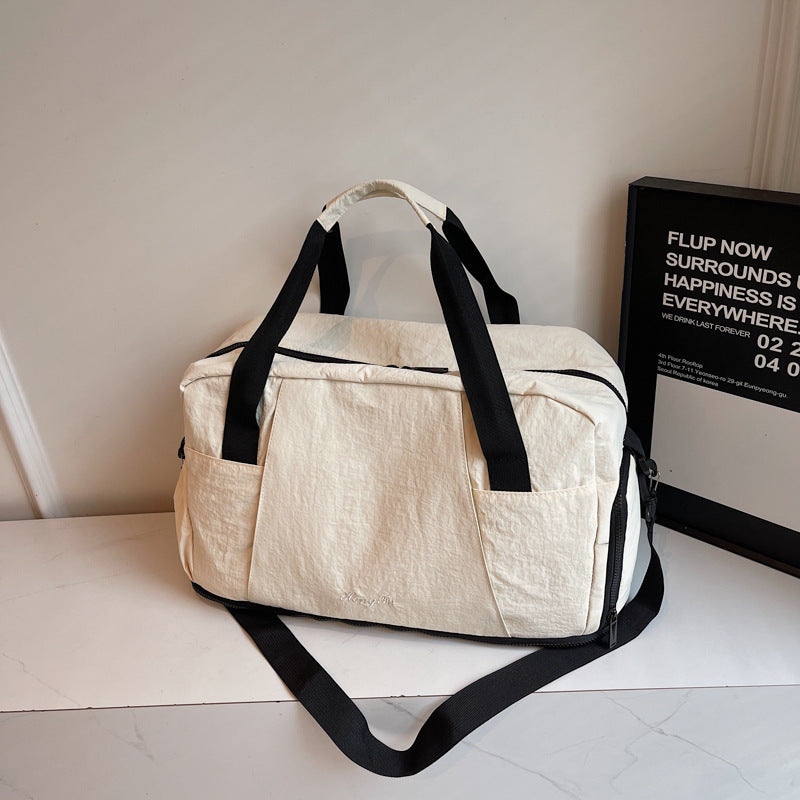 Sporty travel bag with practical outer pockets Kalsten