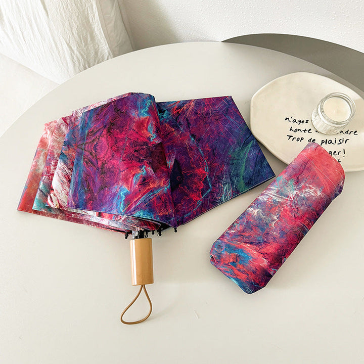 Ladies elegant folding umbrella with unique marble pattern Kalsten