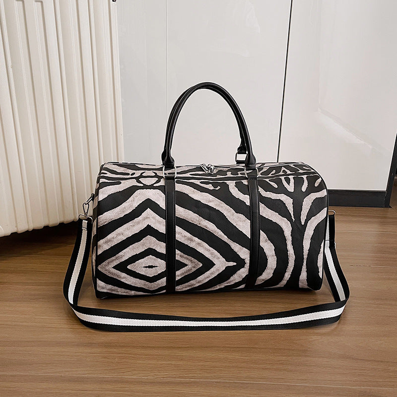 Sporty travel bag in trendy zebra pattern Kalsten