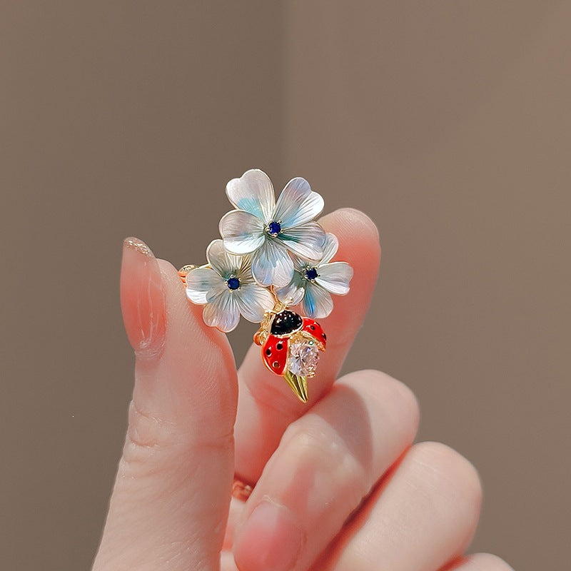 Flower brooch with ladybug and crystal Kalsten