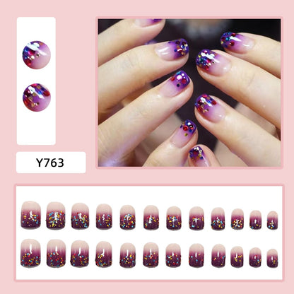 False nails with glamorous glitter design Acalora