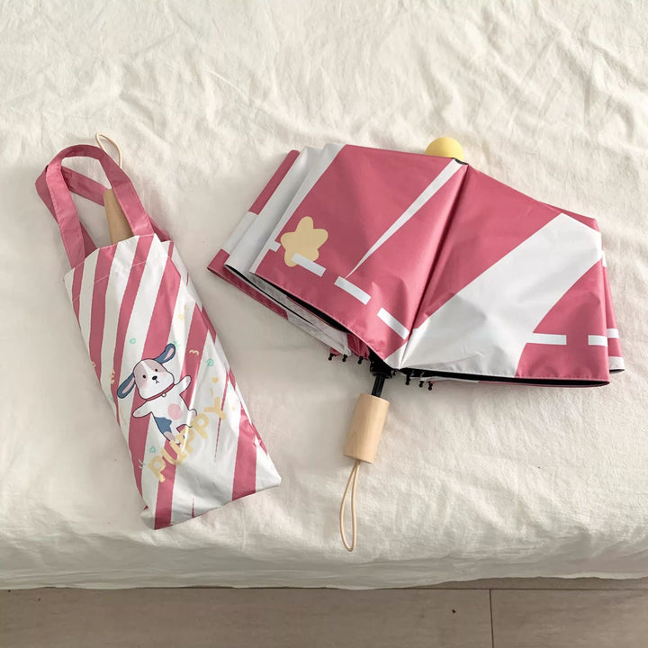 Ladies elegant folding umbrella with ergonomic wooden handle and protective carrying case Kalsten