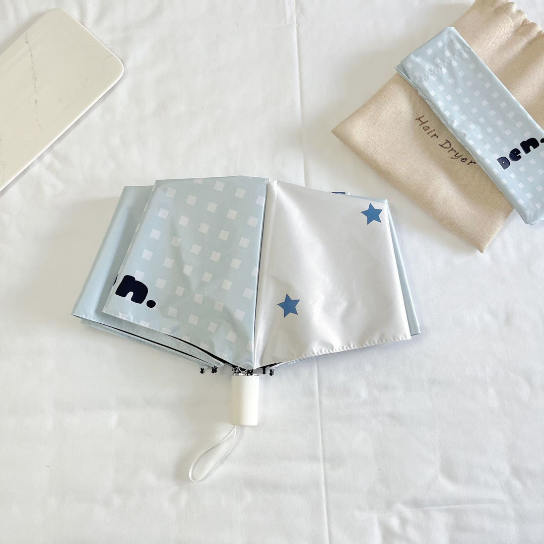 Women's folding umbrella with unique star pattern and practical carrying bag Kalsten