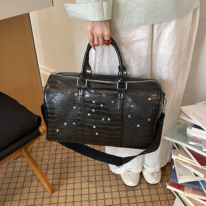 Fashionable travel bag with structured surface and versatile interior Kalsten