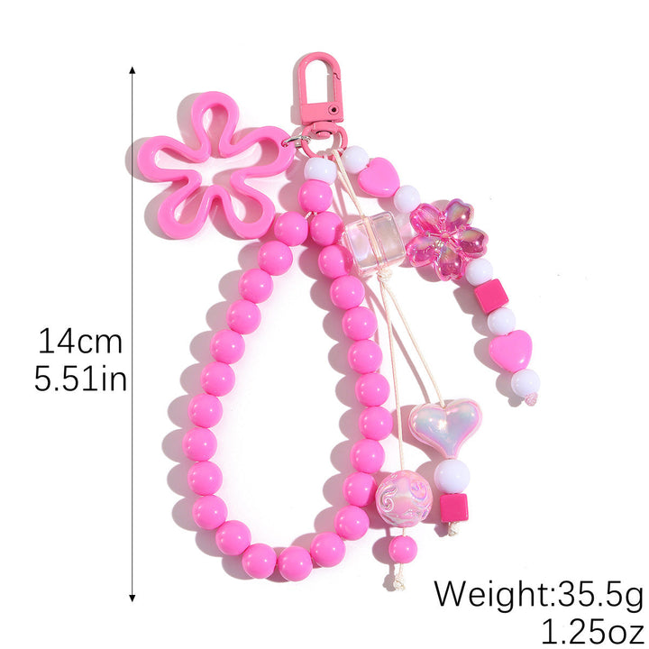 Playful keychain with flower and butterfly details Kalsten