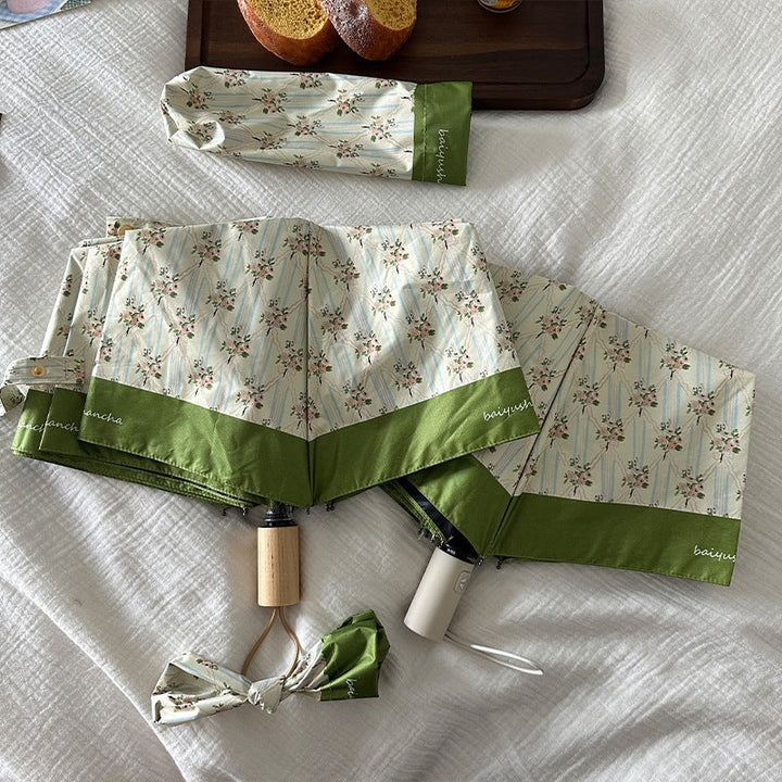Ladies elegant folding umbrella with floral design Kalsten
