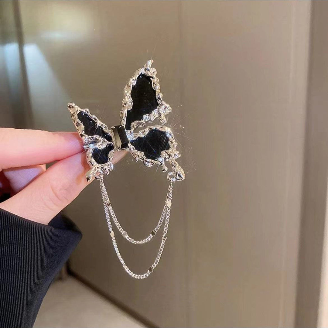 Elegant brooch with flower and chain motif Kalsten