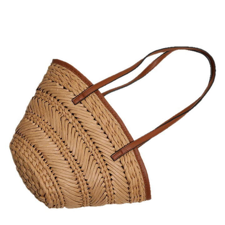 Braided basket bag with innovative leather handles Kalsten