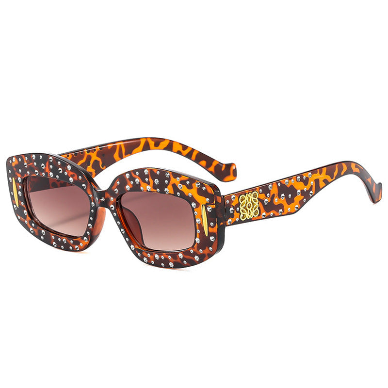 Women striking sunglasses with glamorous rhinestone details Kalsten
