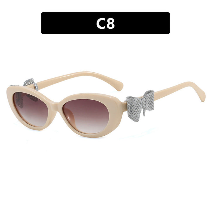 Women's fashionable sunglasses with playful bow design Kalsten